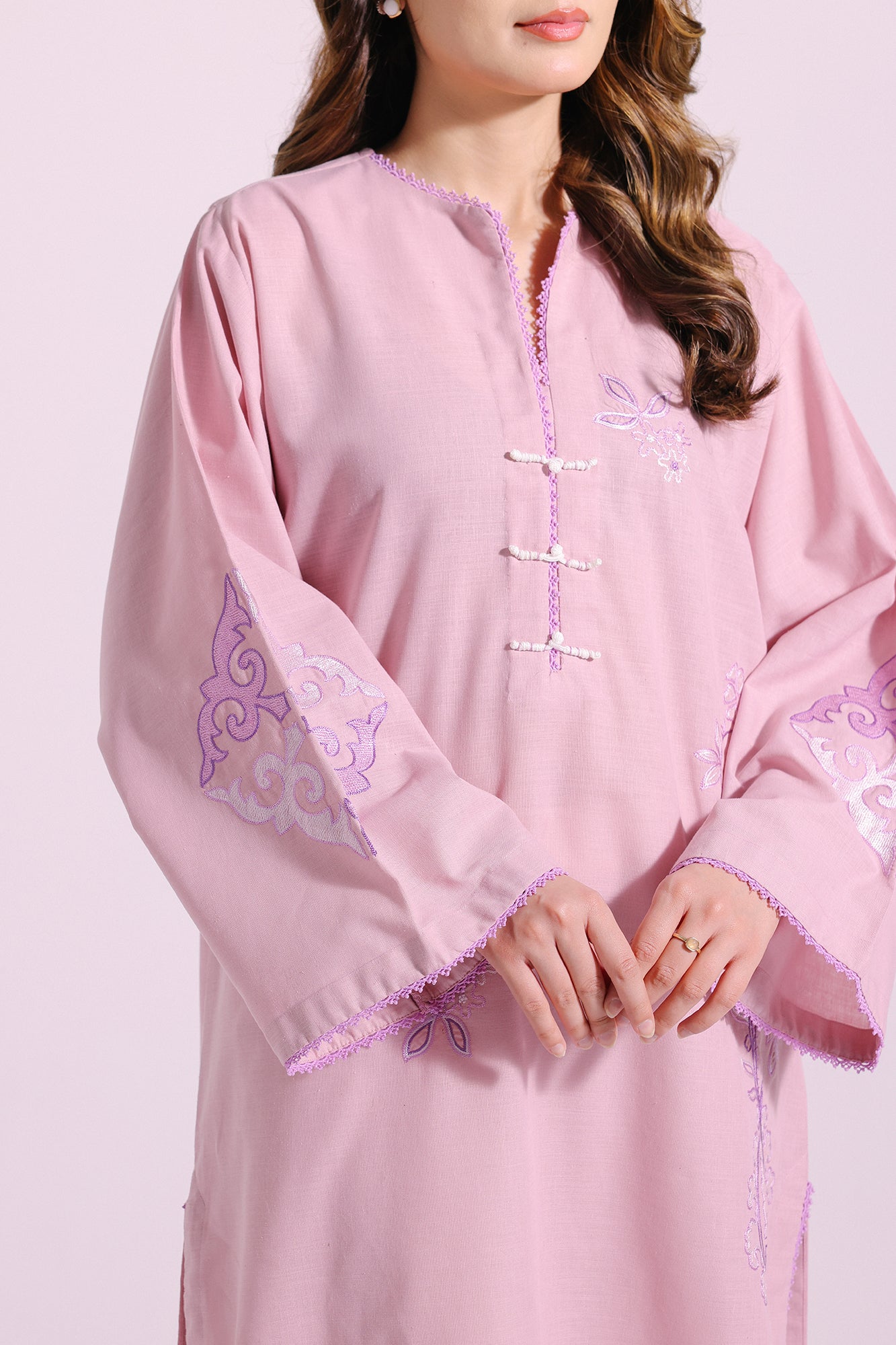 pink embroidered shirt